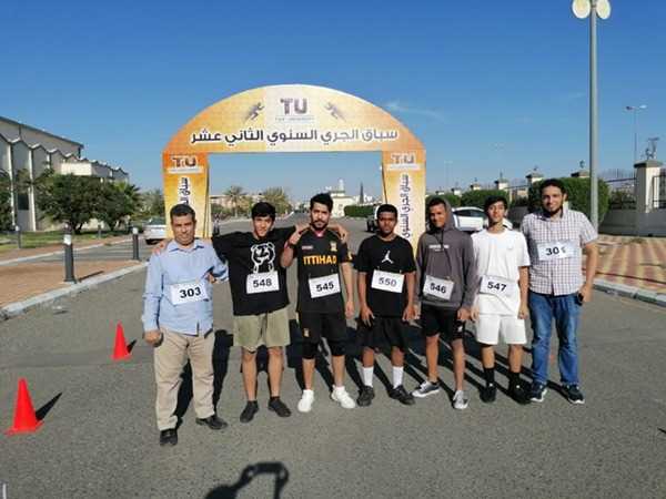 The participation of college students and faculty members in the running competition at Taif University 